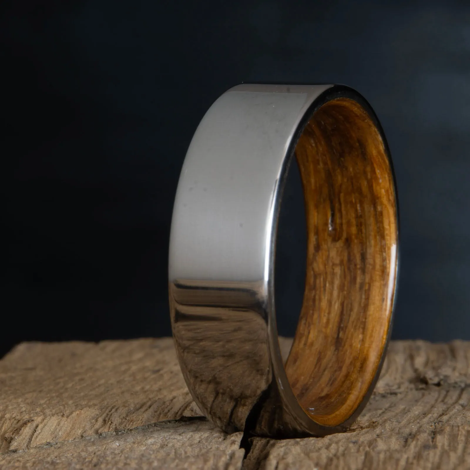 Classic titanium wedding band with whiskey barrel wood