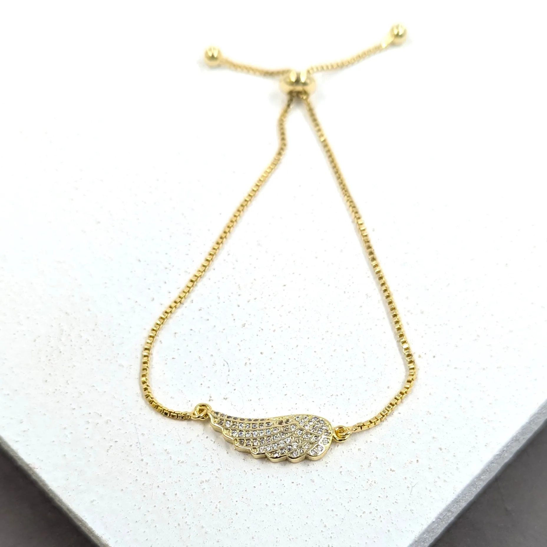 Crystal encrusted angel wing friendship bracelet
