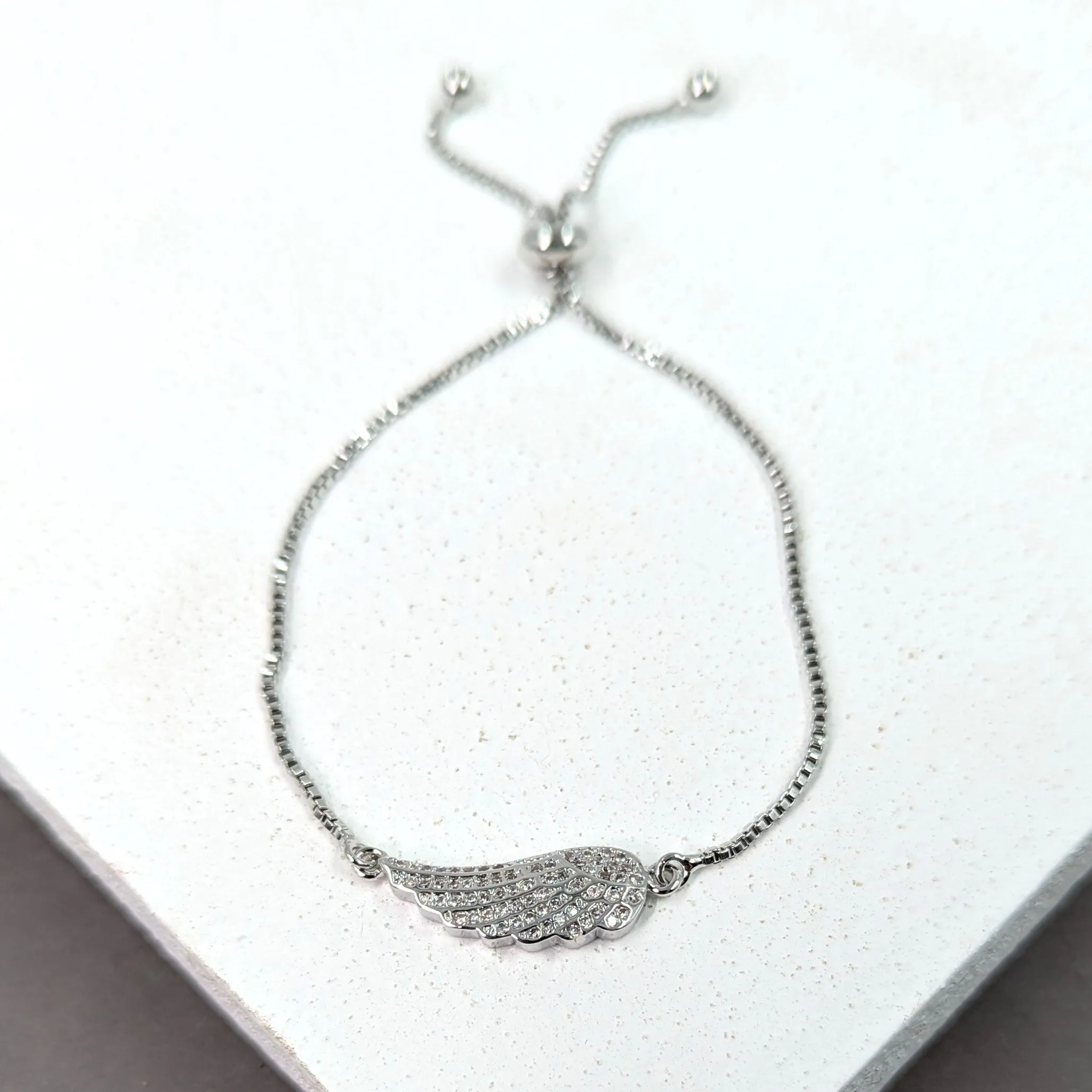 Crystal encrusted angel wing friendship bracelet
