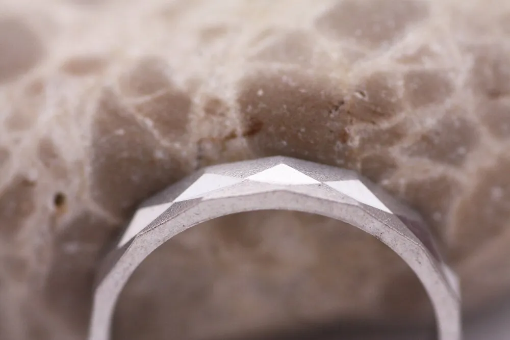 Faceted gold wedding band