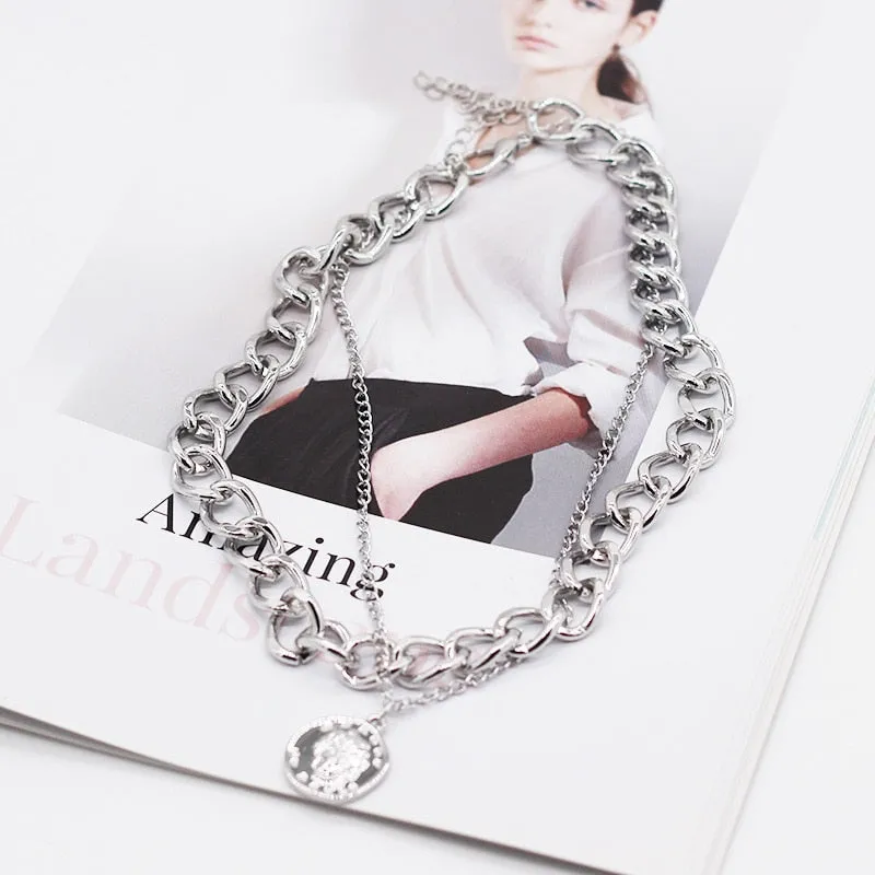 Vintage necklace on neck Gold chain